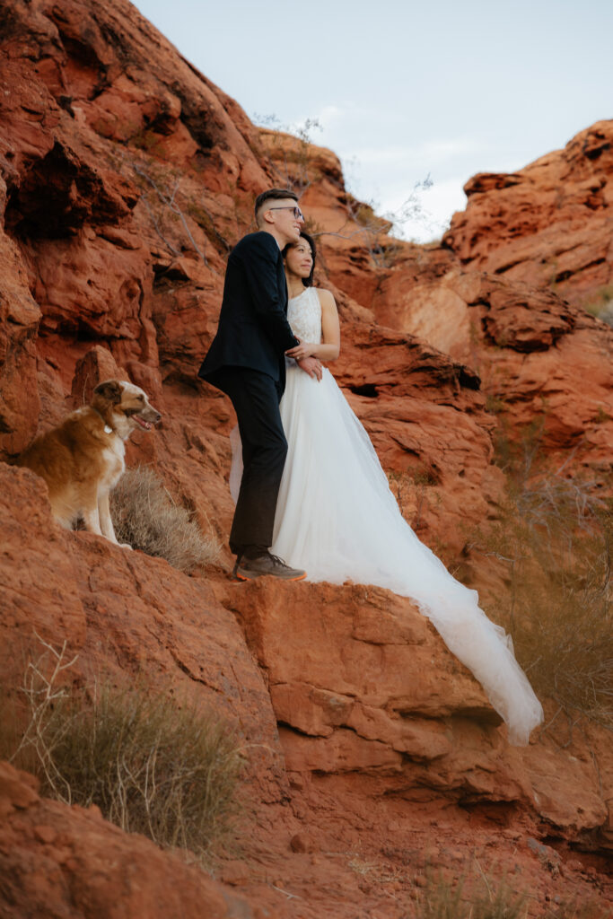 St. George Rappelling bridal session, red rock bridal session, St George bridal session, adventure bridals, red rock wedding photos, unique wedding photos Southern Utah 