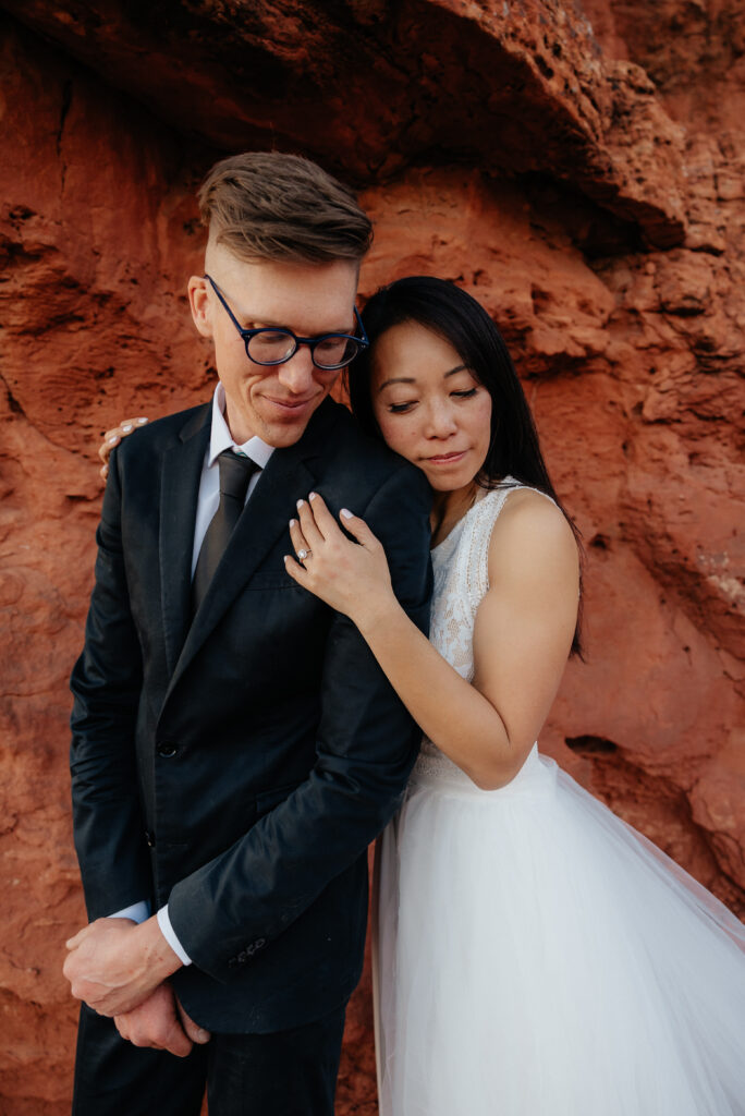 St. George Rappelling bridal session, red rock bridal session, St George bridal session, adventure bridals, red rock wedding photos, unique wedding photos Southern Utah 