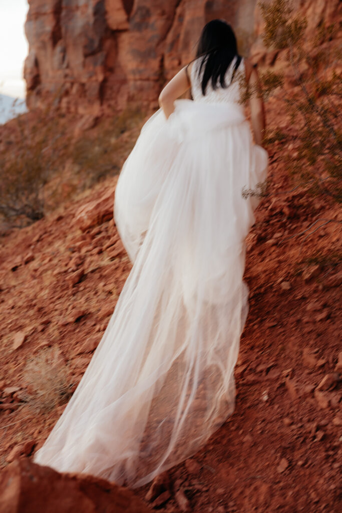 St. George Rappelling bridal session, red rock bridal session, St George bridal session, adventure bridals, red rock wedding photos, unique wedding photos Southern Utah 