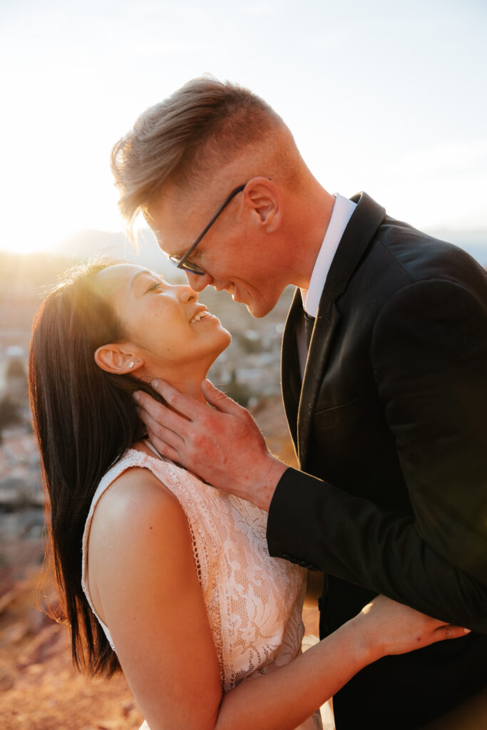 St. George Rappelling bridal session, red rock bridal session, St George bridal session, adventure bridals, red rock wedding photos, unique wedding photos Southern Utah 