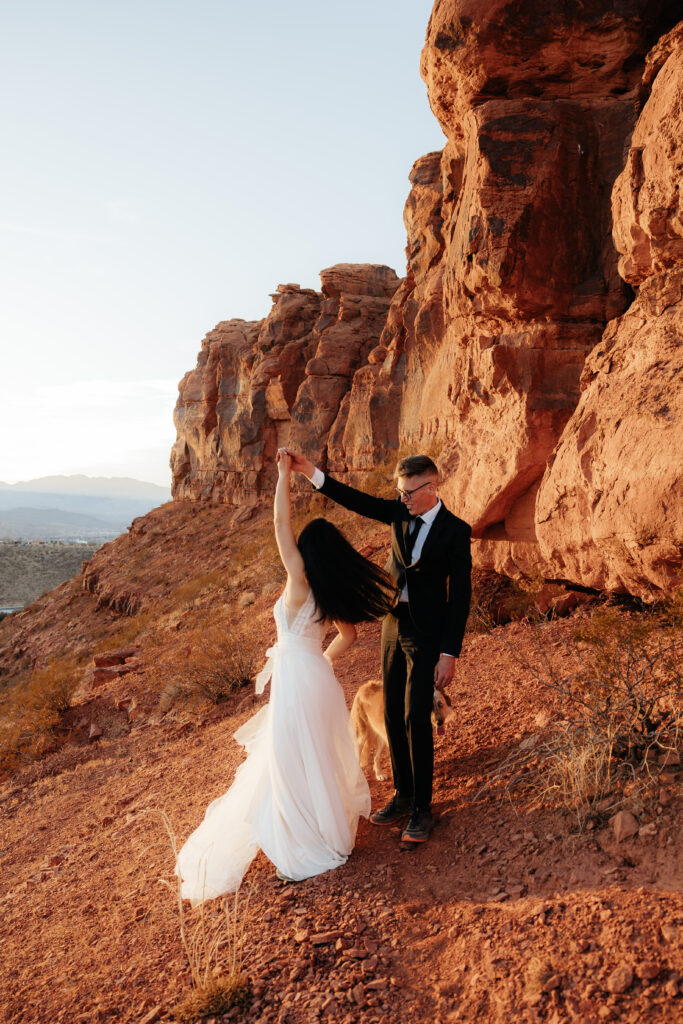 St. George Rappelling bridal session, red rock bridal session, St George bridal session, adventure bridals, red rock wedding photos, unique wedding photos Southern Utah 