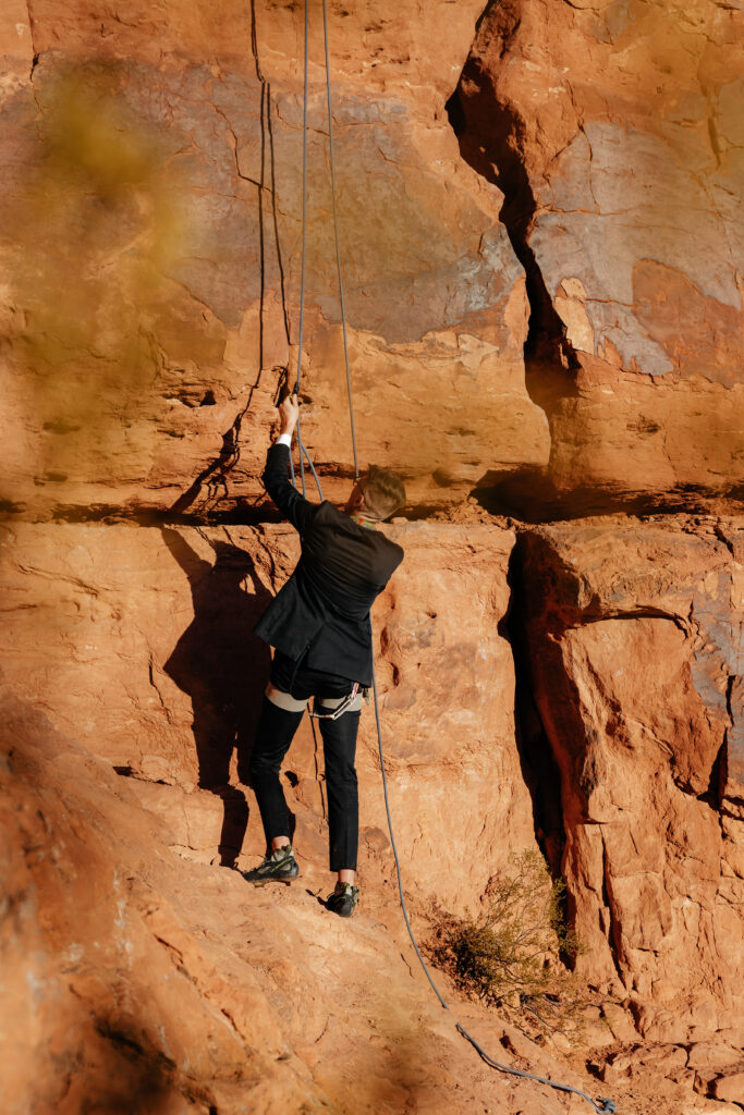 St. George Rappelling bridal session, red rock bridal session, St George bridal session, adventure bridals, red rock wedding photos, unique wedding photos Southern Utah 