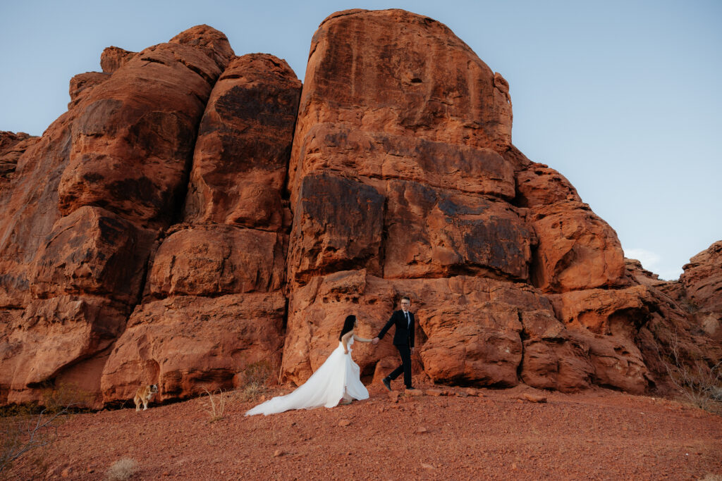 St. George Rappelling bridal session, red rock bridal session, St George bridal session, adventure bridals, red rock wedding photos, unique wedding photos Southern Utah 